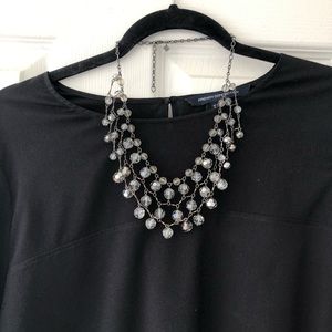 Necklace with moody stone finish